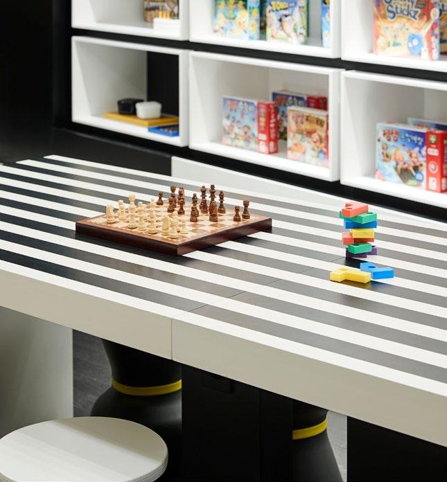 ' Modrak is a board game space where the whole family can get together and play games.