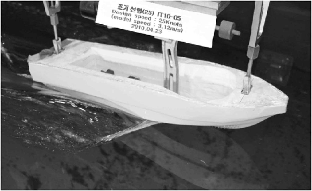 between the scaled initial hull(25) and the designed hull(25) scaled initial Designed hull(25) hull(25) Ship speed(m/s) 3.12 3.12 R VM(CFD) (N) 2.54 2.