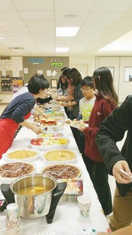 Giving Thanks to God CYO POTLUCK DINNER Students of the 6-8 grades and their families gathered at the parish hall