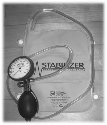 Stabilizer pressure (left) and muscle test process (right) for transversus abdominis muscle by using pressure biofeedback unit (Urquhart et