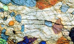 grains of quartz are intergrown within alkali feldspar.