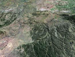 Virginia Dale ring dike d) 암전 (bysmalith): A roughly vertical cylindrical igneous intrusion, bounded by steep faults.