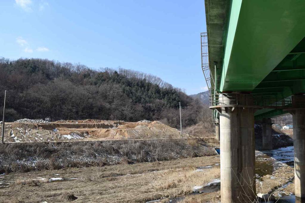 조사지역과바로인접한남서쪽구릉평탄지는지표상에서문화재적가치를띠는유구및유물은확인되지않았지만,