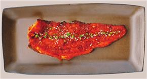 hwangtae gui [ 황태구이 ] E Winter air-dried pollack filleted, deboned, and brushed with a gochu jang sauce and grilled.