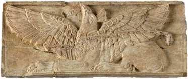 풍성한곱슬머리로미루어보아이집트의여신하토르상의영향을받은것 같다. [ 므깃도] 그리핀플라크 Griffin Plaque, 청동기후기, 13세기 역시므깃도유적에서발견된코끼리상아유물중하나이다.