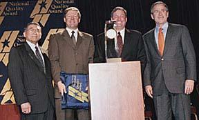 Malcolm Baldrige National Quality Award (L-R): Secretary Mineta; Steve Wells, president,