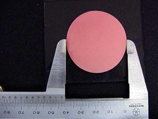 을 0.5 mm정확도로측정하였다 (Fig. 8). 5 회실험하여 10 개직경의평균과표 준편차를구하였다. Fig. 8. Consistency measurement. 다. 압축변형률 ISO 4823(1992) 규정에따라 50 mm 50 mm, 두께 3 mm의유리판위에외경 25 mm, 내경 20.5 mm, 높이 (19.5±0.