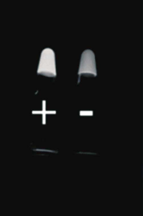 (B) Positive (luminescence, left) and negative (matte, right) fluorescent detection under ultraviolet light.